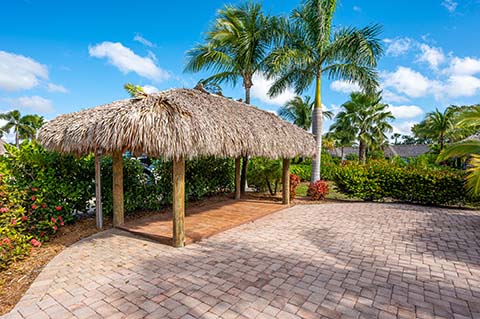 Chickee huts at the RV sites at Everglades Isle RV Motorcoach Resort.